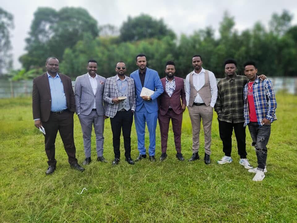 The Gospel for Today's Generation ministry team standing together in a field